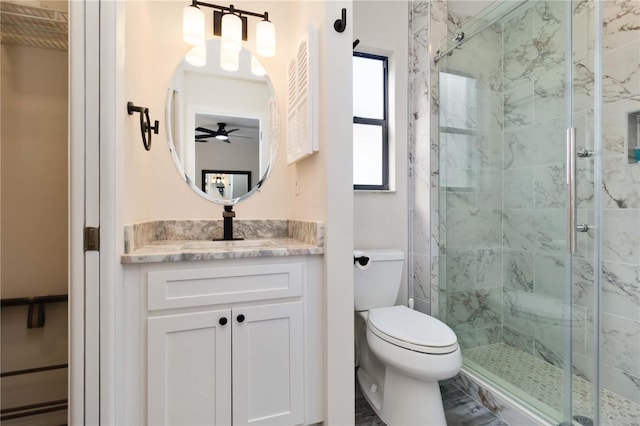 1439 Strada D Argento, Venice, FL 34292 - full bathroom with a shower stall, toilet, vanity, and ceiling fan
