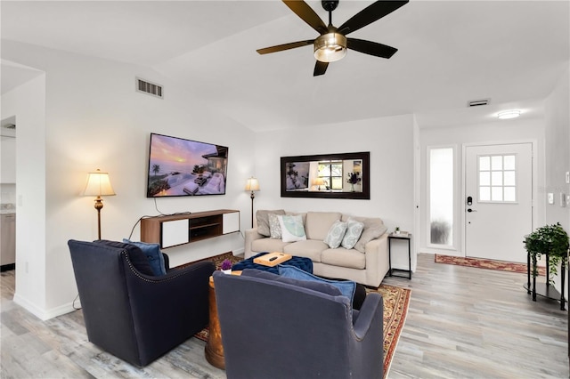 1439 Strada D Argento, Venice, FL 34292 - living area with light wood finished floors, a ceiling fan, and vaulted ceiling