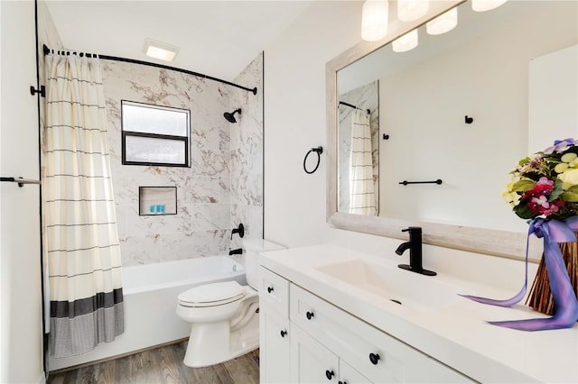 1439 Strada D Argento, Venice, FL 34292 - bathroom with vanity, wood finished floors, and shower / bath combo with shower curtain