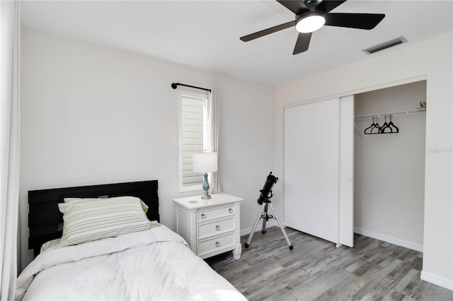 1439 Strada D Argento, Venice, FL 34292 - bedroom featuring wood finished floors, a closet, and ceiling fan