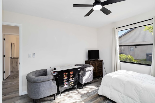 1439 Strada D Argento, Venice, FL 34292 - bedroom with wood finished floors and a ceiling fan