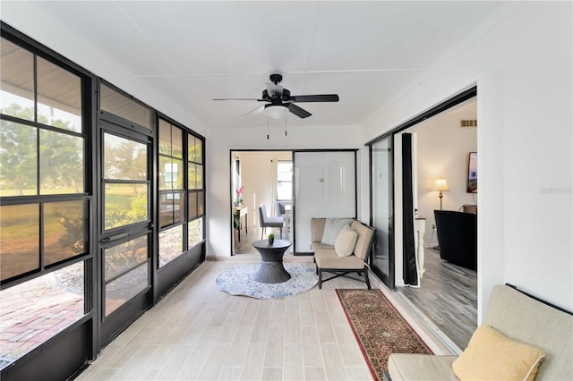 1439 Strada D Argento, Venice, FL 34292 - sunroom with a ceiling fan