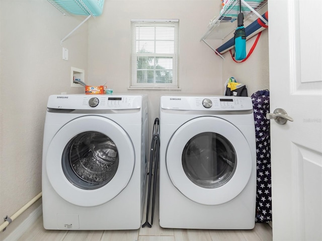 161 Suntan Ave, Sarasota, FL 34237 - laundry area featuring washer and clothes dryer