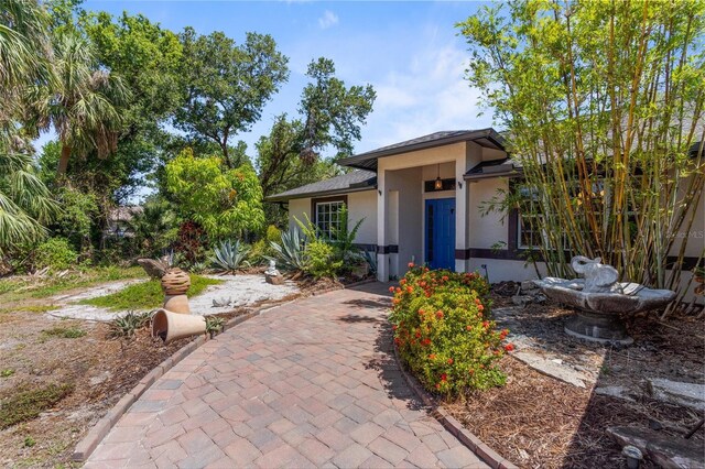 2424 Affinity Ln, North Port, FL 34286 - view of front of property with stucco siding