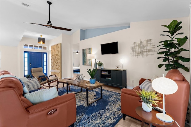 2424 Affinity Ln, North Port, FL 34286 - living area with lofted ceiling, ceiling fan, wood finished floors, and baseboards