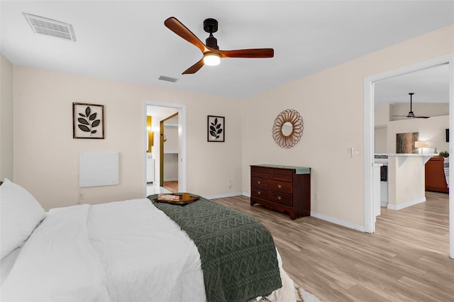 2424 Affinity Ln, North Port, FL 34286 - bedroom with light wood finished floors, baseboards, and a ceiling fan