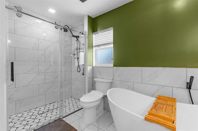 2424 Affinity Ln, North Port, FL 34286 - full bathroom with a shower stall, toilet, and a soaking tub