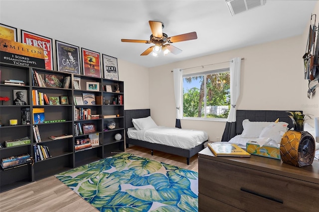2424 Affinity Ln, North Port, FL 34286 - bedroom featuring wood finished floors and a ceiling fan