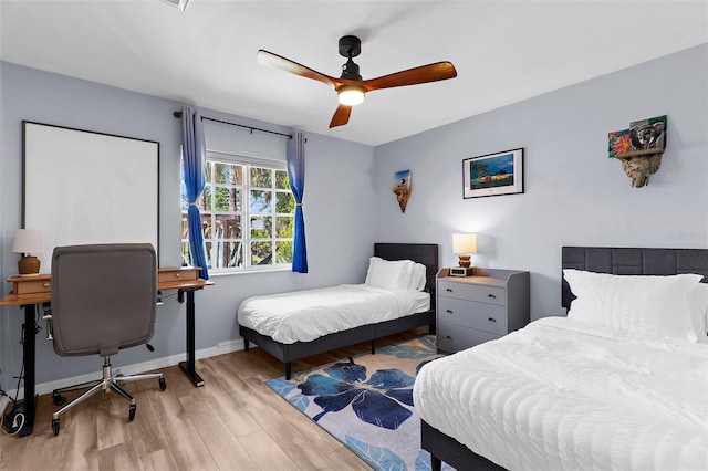 2424 Affinity Ln, North Port, FL 34286 - bedroom featuring light wood-style flooring, baseboards, and ceiling fan