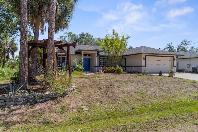 2424 Affinity Ln, North Port, FL 34286 - ranch-style home with stucco siding, an attached garage, concrete driveway, and a front yard