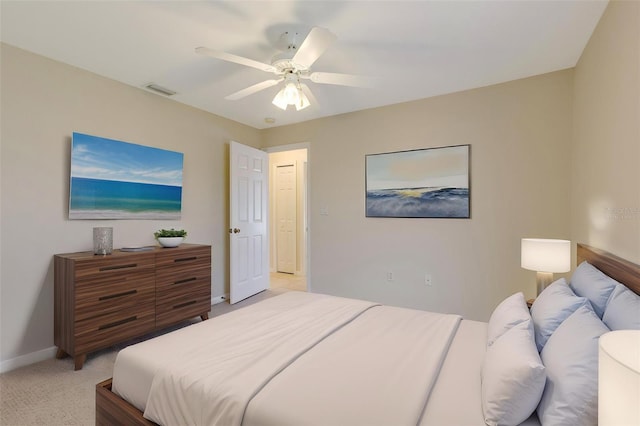 3851 Sterling Rd, Venice, FL 34293 - bedroom featuring light carpet, baseboards, and a ceiling fan