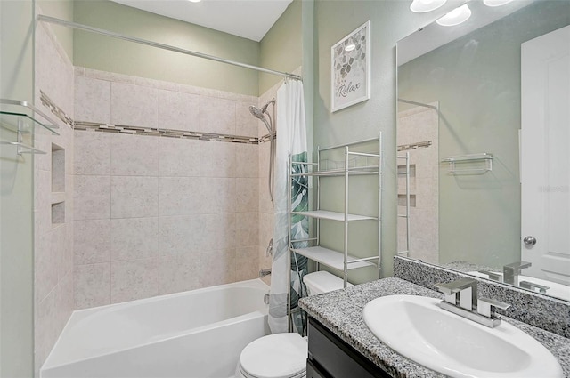 bathroom with shower / bath combo, toilet, and vanity