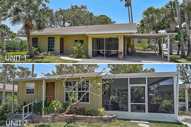417 Shore Rd Unit A & B, Nokomis, FL 34275 - back of house with a sunroom and board and batten siding