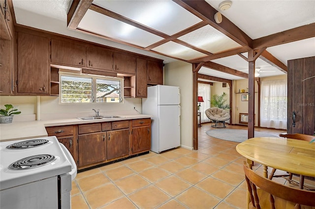 417 Shore Rd Unit A & B, Nokomis, FL 34275 - kitchen featuring white appliances, open shelves, a sink, light countertops, and plenty of natural light