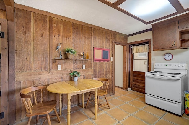 417 Shore Rd Unit A & B, Nokomis, FL 34275 - dining space featuring wood walls and light tile patterned floors