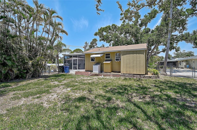 417 Shore Rd Unit A & B, Nokomis, FL 34275 - back of property with a sunroom