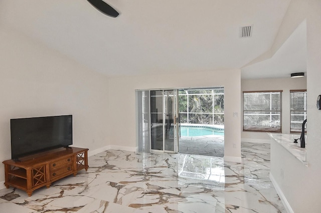 27416 Natal Dr, Punta Gorda, FL 33983 - living room with light marble finish flooring and baseboards