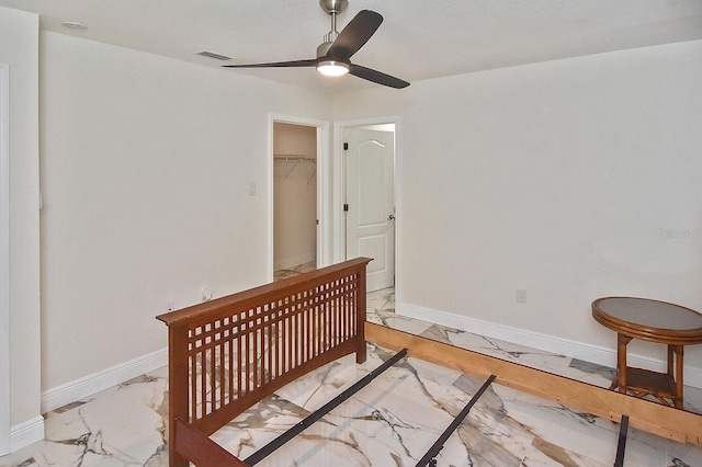 27416 Natal Dr, Punta Gorda, FL 33983 - bedroom featuring marble finish floors, baseboards, and a ceiling fan