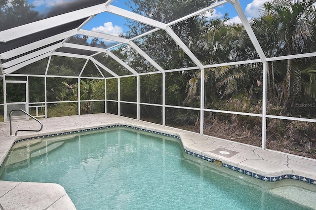 27416 Natal Dr, Punta Gorda, FL 33983 - swimming pool featuring a patio and a lanai