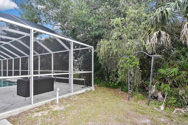 27416 Natal Dr, Punta Gorda, FL 33983 - view of yard featuring a lanai, a patio area, and an outdoor pool