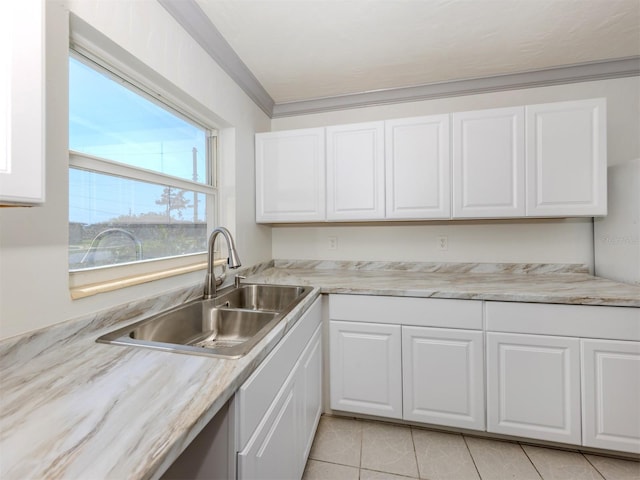 6231 Jordan St, North Port, FL 34287 - kitchen with a sink, white cabinets, light tile patterned flooring, and light countertops