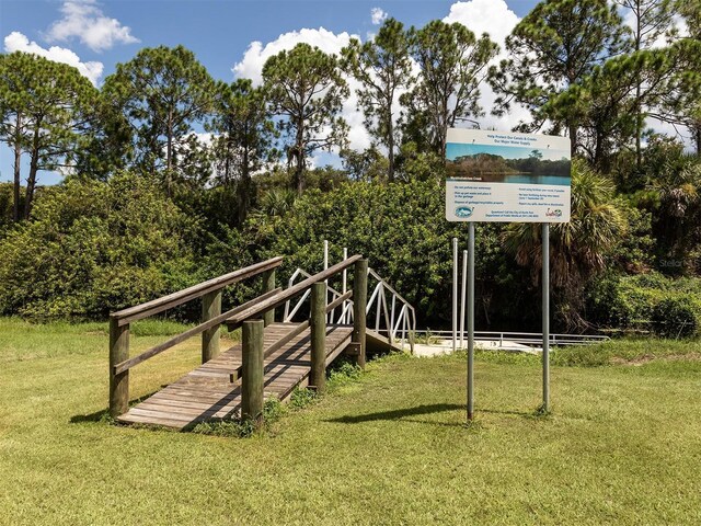 6231 Jordan St, North Port, FL 34287 - surrounding community featuring a yard