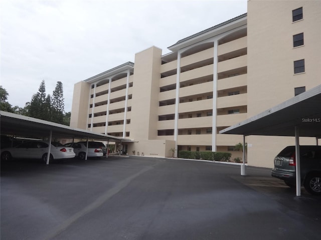 512 W Venice Ave Unit 205, Venice, FL 34285 - view of building exterior with covered parking