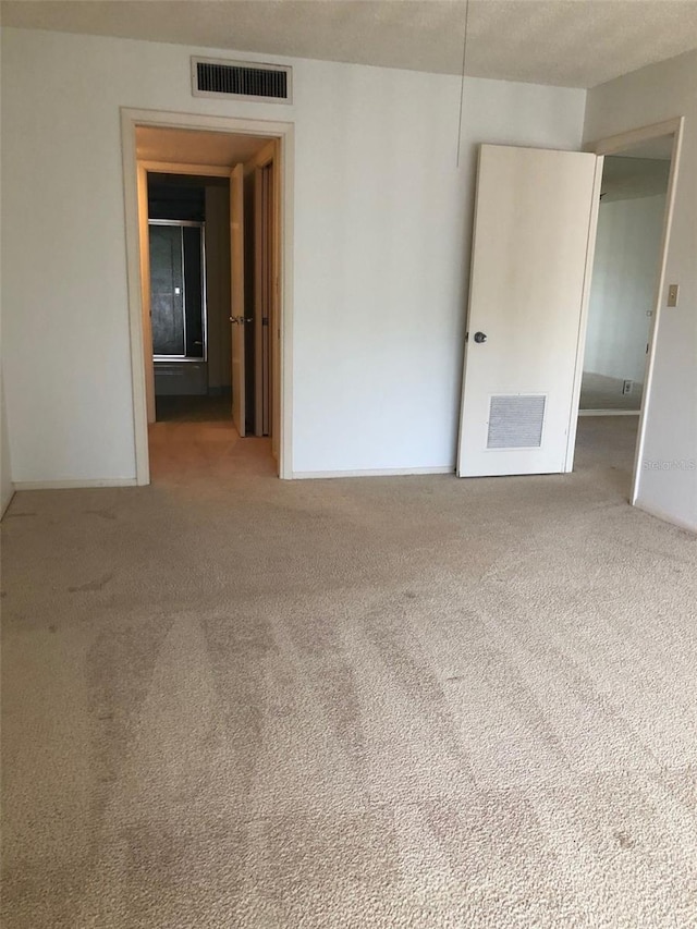 512 W Venice Ave Unit 205, Venice, FL 34285 - view of carpeted empty room