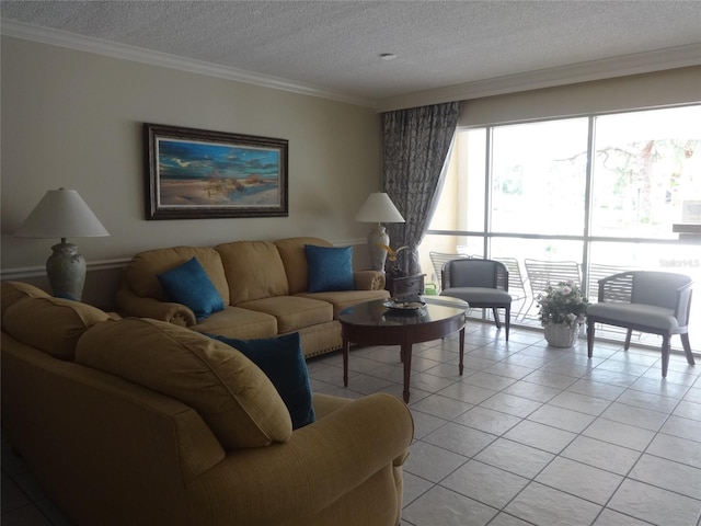512 W Venice Ave Unit 205, Venice, FL 34285 - living room featuring a textured ceiling, light tile patterned floors, and crown molding