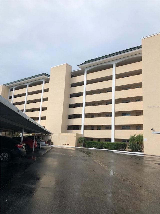 512 W Venice Ave Unit 205, Venice, FL 34285 - view of building exterior featuring covered parking