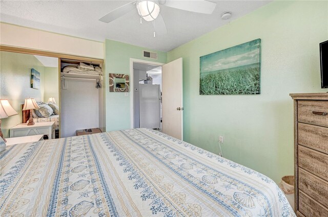 422 Polk Ave, Cape Canaveral, FL 32920 - bedroom featuring ceiling fan and a closet