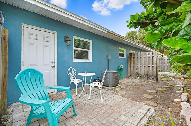 422 Polk Ave, Cape Canaveral, FL 32920 - view of patio featuring cooling unit