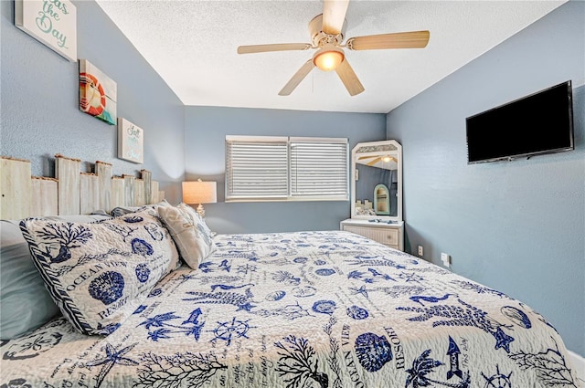 422 Polk Ave, Cape Canaveral, FL 32920 - bedroom featuring a textured ceiling and a ceiling fan