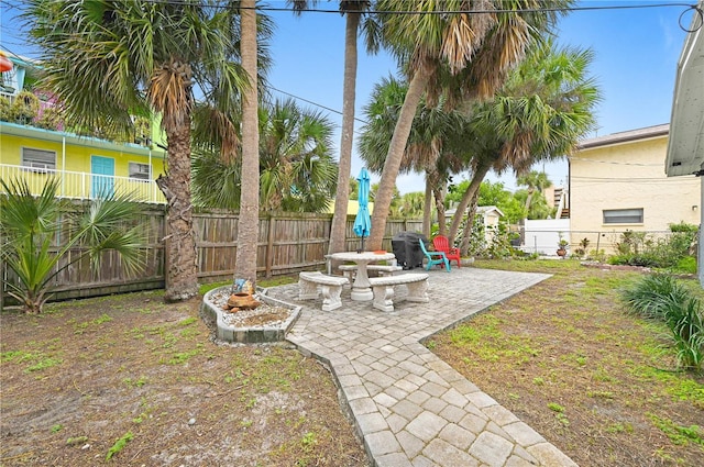 422 Polk Ave, Cape Canaveral, FL 32920 - fenced backyard with a patio area