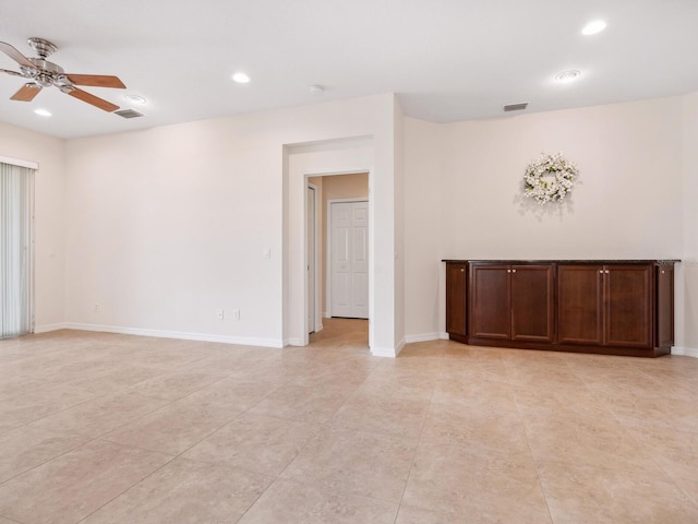 1493 Maseno Dr, Venice, FL 34292 - unfurnished room featuring ceiling fan, recessed lighting, light tile patterned flooring, and baseboards