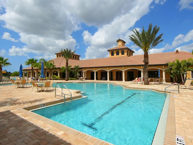 1493 Maseno Dr, Venice, FL 34292 - community pool featuring a patio area