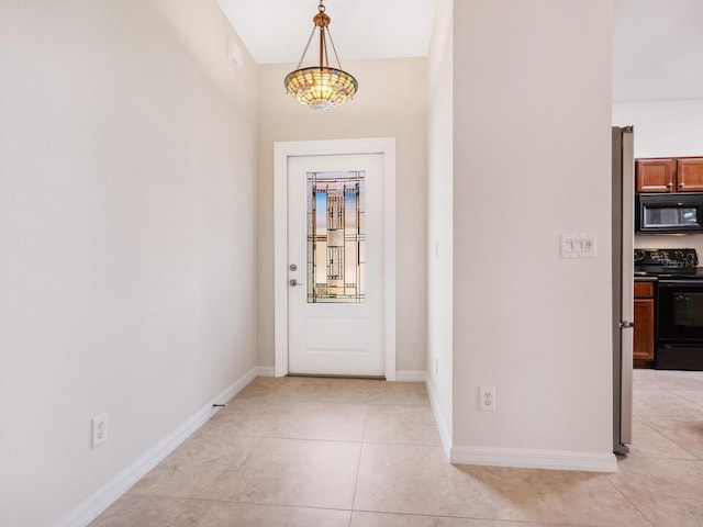 1493 Maseno Dr, Venice, FL 34292 - entryway with light tile patterned floors and baseboards