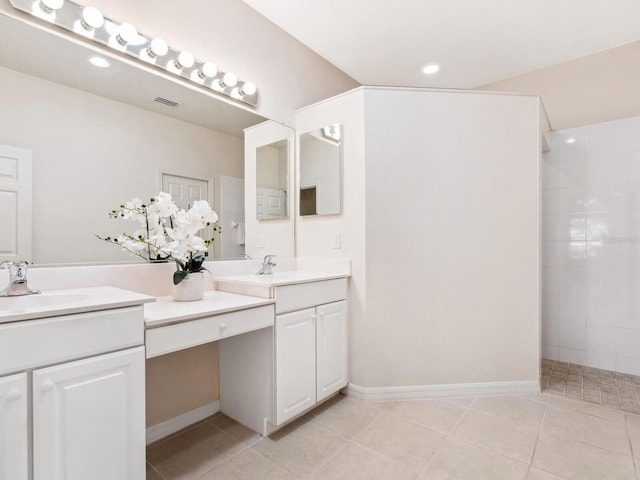 1493 Maseno Dr, Venice, FL 34292 - full bathroom with vanity, tile patterned floors, a walk in shower, baseboards, and recessed lighting