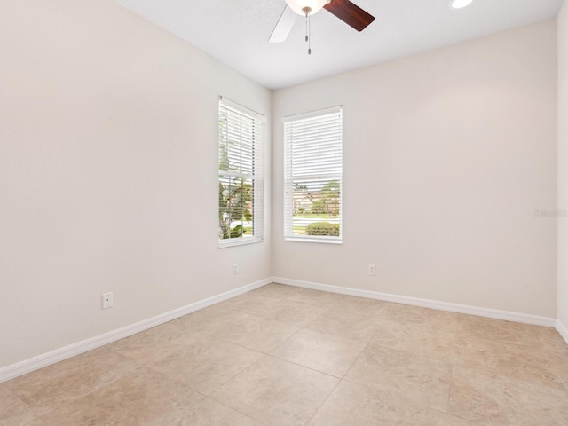 1493 Maseno Dr, Venice, FL 34292 - empty room featuring ceiling fan, baseboards, and light tile patterned floors