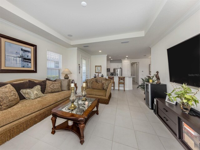 5853 Semolino St, Nokomis, FL 34275 - living area with a raised ceiling, light tile patterned floors, and recessed lighting