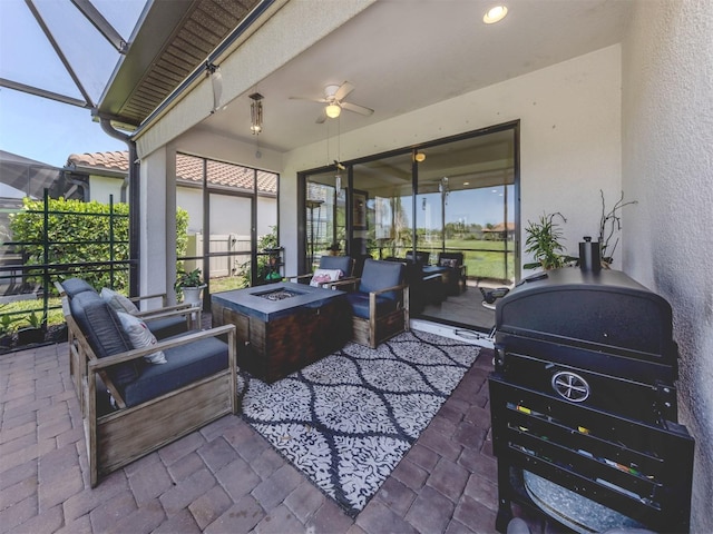 5853 Semolino St, Nokomis, FL 34275 - view of patio / terrace with an outdoor living space with a fire pit, a ceiling fan, a grill, and glass enclosure