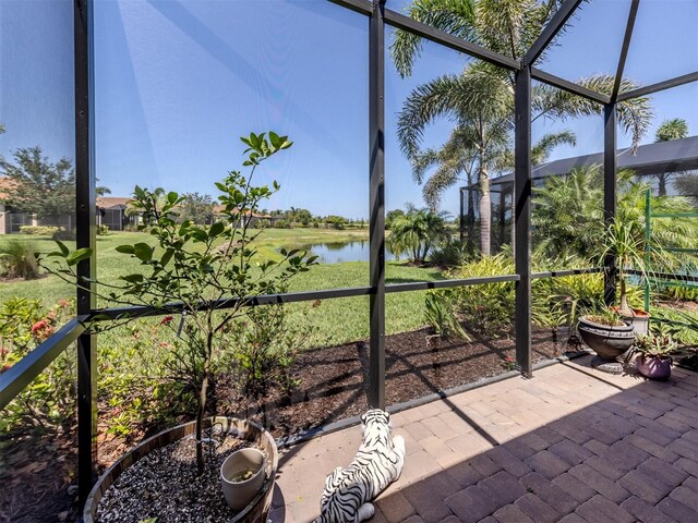 5853 Semolino St, Nokomis, FL 34275 - unfurnished sunroom with a water view