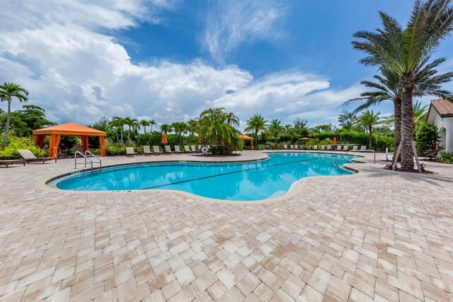 5853 Semolino St, Nokomis, FL 34275 - community pool featuring a gazebo and a patio