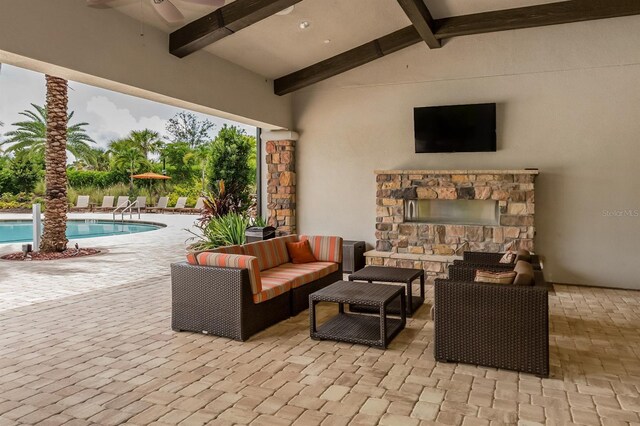 5853 Semolino St, Nokomis, FL 34275 - view of patio / terrace featuring ceiling fan, an outdoor pool, and an outdoor hangout area