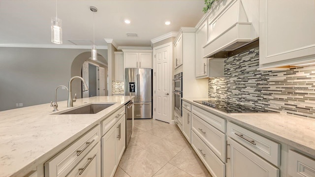 1481 Hyssop Loop, North Port, FL 34289 - kitchen with custom exhaust hood, a sink, stainless steel appliances, ornamental molding, and decorative backsplash