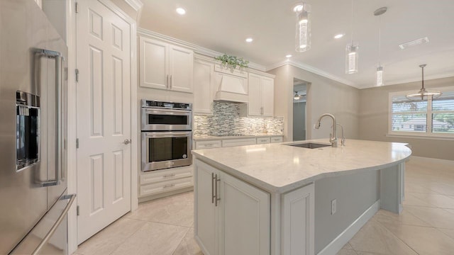 1481 Hyssop Loop, North Port, FL 34289 - kitchen with a sink, appliances with stainless steel finishes, light tile patterned floors, decorative backsplash, and white cabinets