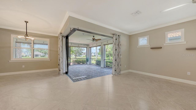 1481 Hyssop Loop, North Port, FL 34289 - empty room with crown molding, baseboards, and light tile patterned floors