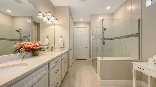 1481 Hyssop Loop, North Port, FL 34289 - full bath with a shower stall, double vanity, recessed lighting, baseboards, and tile patterned flooring