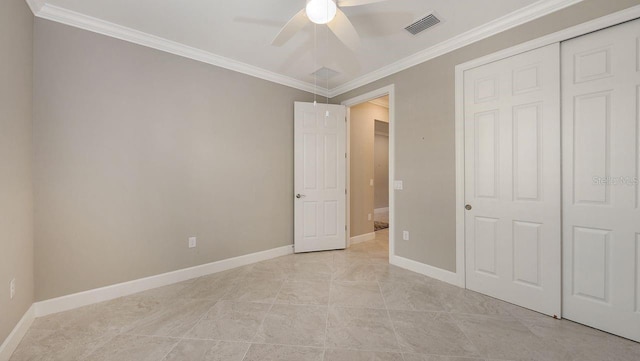 1481 Hyssop Loop, North Port, FL 34289 - unfurnished bedroom featuring ornamental molding, a closet, baseboards, and a ceiling fan