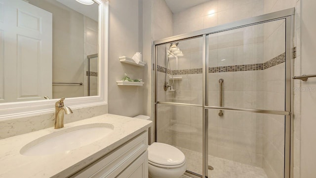1481 Hyssop Loop, North Port, FL 34289 - full bathroom featuring toilet, vanity, and a shower stall